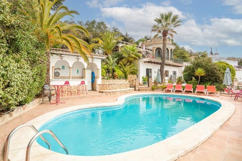 Property building, Living room, Swimming pool