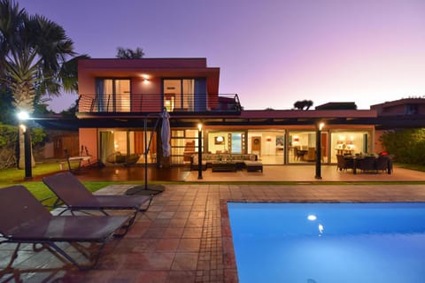 Property building, Night, Pool view, Swimming pool, sunbed