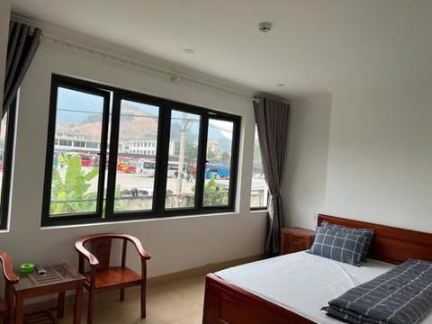 Bed, Living room, Seating area, Bedroom