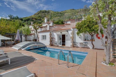 Property building, Living room, Swimming pool