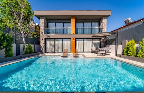 Property building, Patio, Day, Pool view, Swimming pool