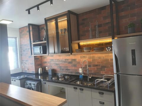 Kitchen or kitchenette, dishwasher, minibar, oven, stove