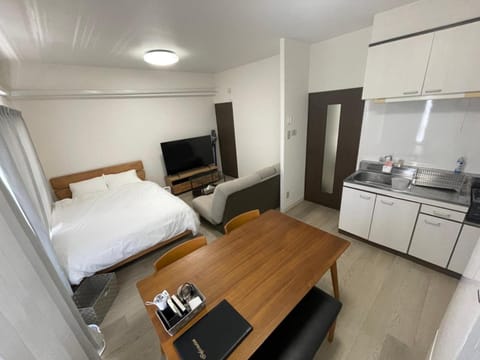 TV and multimedia, Kitchen or kitchenette, Photo of the whole room, Dining area, Bedroom