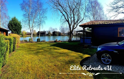 Elite Retreats 4U Lakeside Hot Tub Log Cabin with the fishing peg at Tattershall Lakes Park Cabin in Tattershall