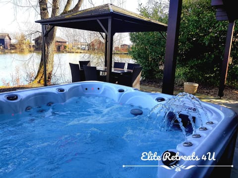 Elite Retreats 4U Lakeside Hot Tub Log Cabin with the fishing peg at Tattershall Lakes Park Cabin in Tattershall