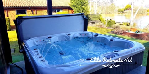 Elite Retreats 4U Lakeside Hot Tub Log Cabin with the fishing peg at Tattershall Lakes Park Cabin in Tattershall