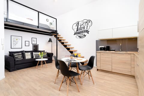 Kitchen or kitchenette, Living room, Seating area, Dining area