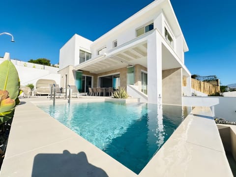 Property building, Living room, Swimming pool