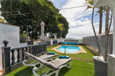 Property building, Living room, Swimming pool