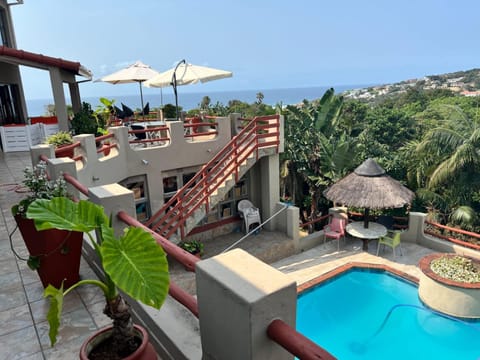Property building, Natural landscape, View (from property/room), Balcony/Terrace, Pool view, Sea view, Swimming pool