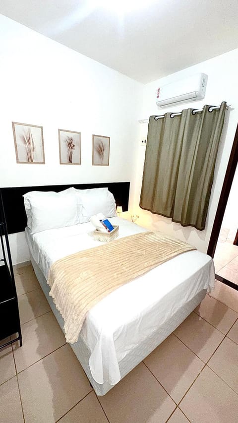 Bed, Photo of the whole room, Bedroom, towels, air conditioner