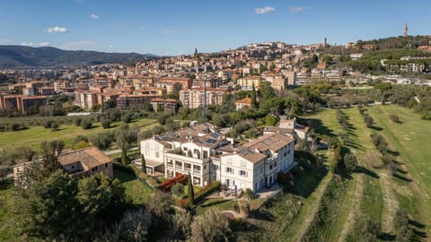 Property building, Nearby landmark, Spring, Neighbourhood, Natural landscape, Bird's eye view, City view, Mountain view, Street view