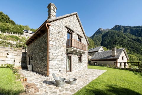 Property building, Nearby landmark, Spring, Day, Natural landscape, Landmark view, Mountain view