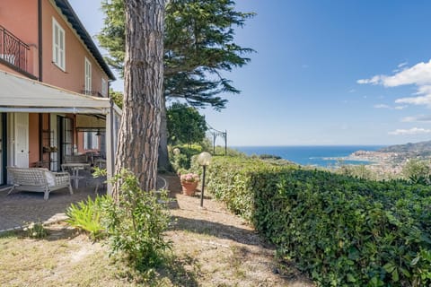 Property building, Patio, Natural landscape, Garden, Sea view