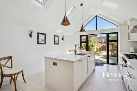 Kitchen or kitchenette, dishwasher, oven, stove