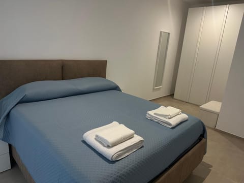 Bed, Photo of the whole room, Bedroom, towels, wardrobe