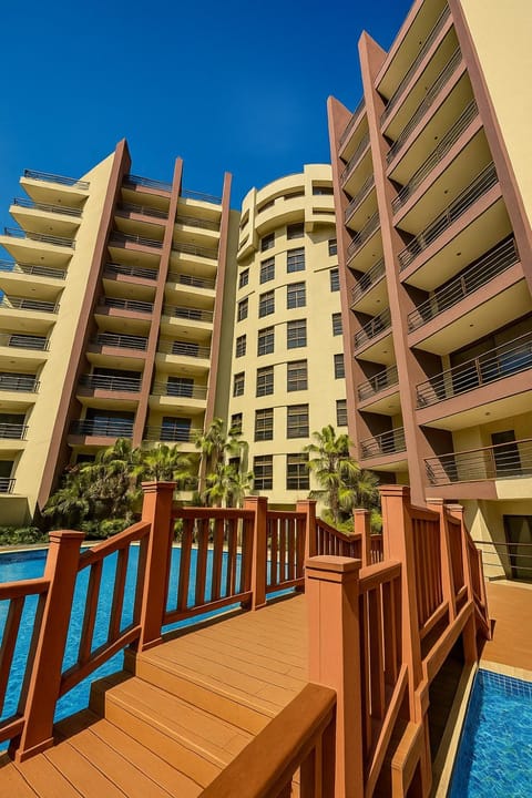 Property building, Pool view, Swimming pool, sunbed