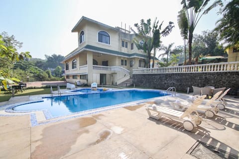 Property building, Pool view, Swimming pool, sunbed