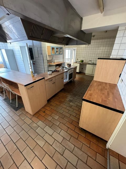Kitchen or kitchenette, oven, stove