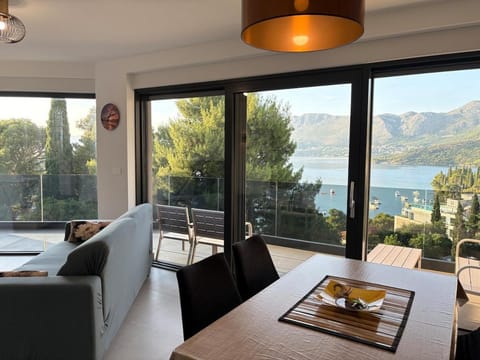 Patio, Day, Natural landscape, View (from property/room), Balcony/Terrace, Living room, Seating area, Dining area, Mountain view, Sea view