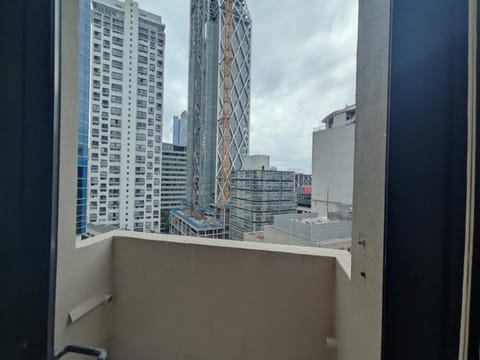 3 Double Beds and 1 Single Bed and 2 Double Sofa Beds in a small 2 Bedrooms Penthouse Apartment in Auckland