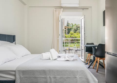 Bed, Photo of the whole room, Bedroom, towels, air conditioner