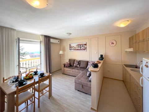 Kitchen or kitchenette, Living room, Seating area, Dining area, Sea view