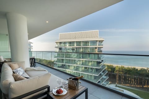 Property building, Patio, Day, Natural landscape, View (from property/room), Balcony/Terrace, Seating area, Food, Sea view