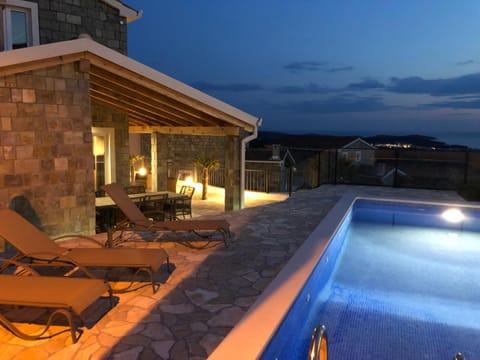 Property building, Night, Swimming pool