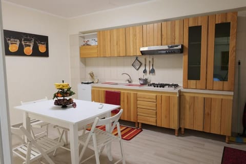 Kitchen or kitchenette, Living room, stove