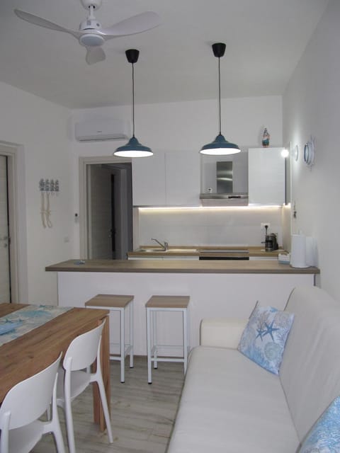 Kitchen or kitchenette, Living room, Photo of the whole room, Dining area, stove