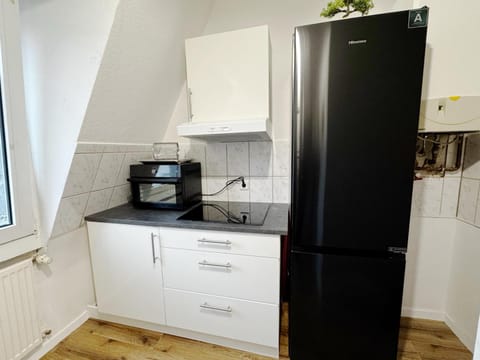 Kitchen or kitchenette, oven, stove