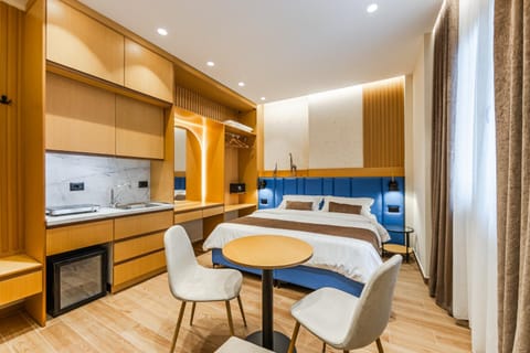 Bed, View (from property/room), Kitchen or kitchenette, Photo of the whole room, Seating area, Dining area, Bedroom, stove