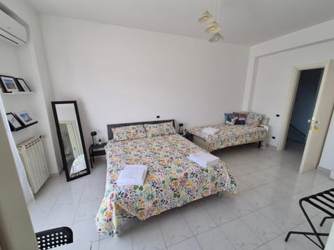 Bed, Photo of the whole room, Bedroom, towels, air conditioner