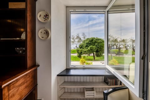 View (from property/room), Living room, Seating area, Sea view, Quiet street view