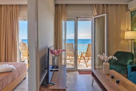 View (from property/room), Balcony/Terrace, Living room, Photo of the whole room, Seating area, Beach, Sea view