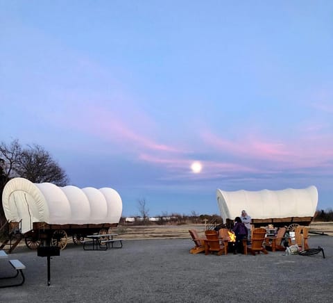 Perfect Glamping Vacations in this Rustic Conestoga Covered Wagon Rental in Oklahoma House in Norman