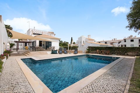 Property building, Living room, Swimming pool