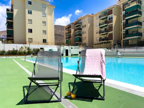 Property building, Pool view, Swimming pool, sunbed