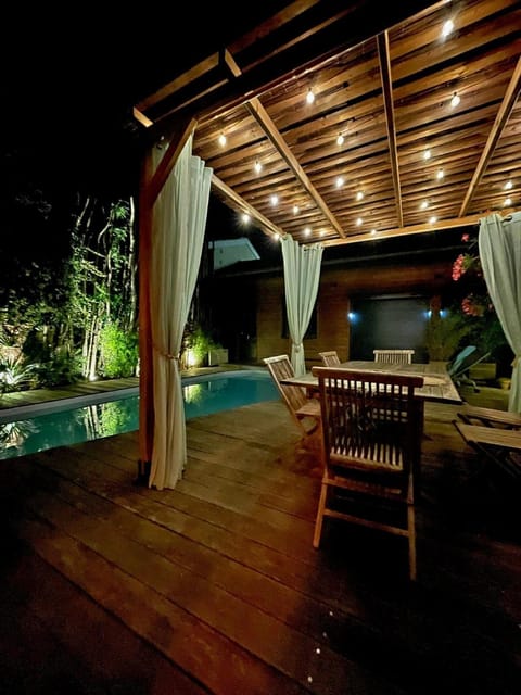 Patio, Night, Dining area, Swimming pool