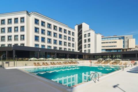 Property building, Off site, Pool view, Swimming pool, sunbed