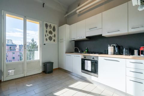 Kitchen or kitchenette, dishwasher, oven, stove, toaster