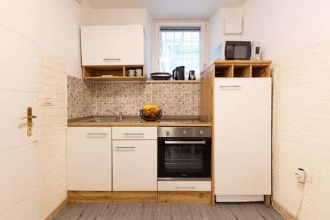 Kitchen or kitchenette, oven, stove, kitchen