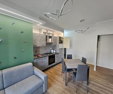 Kitchen or kitchenette, Living room, Seating area, Dining area, dishwasher, oven, stove