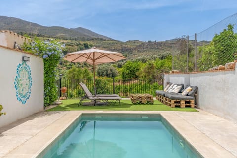 Property building, Living room, Swimming pool