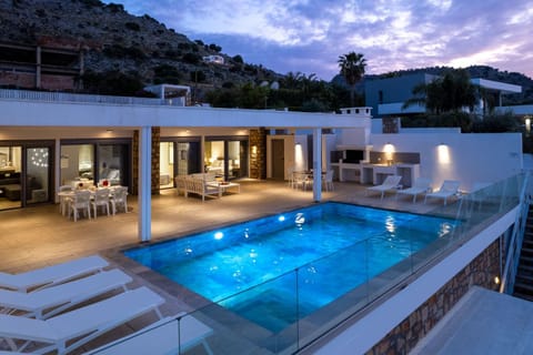Property building, Patio, Day, Night, Natural landscape, Mountain view, Pool view, Swimming pool, sunbed