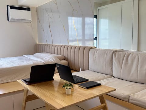 Bed, Living room, Seating area, Bedroom