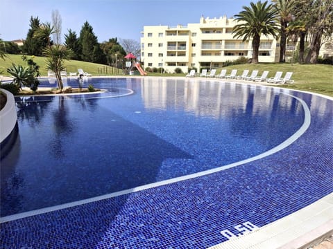 Property building, Pool view, Swimming pool, sunbed