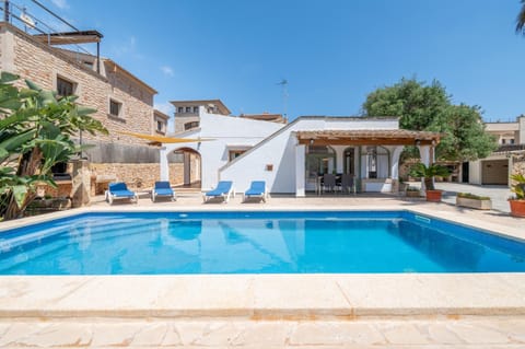 Property building, Living room, Swimming pool