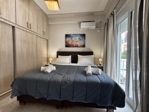 Bed, Bedroom, towels, wardrobe, air conditioner